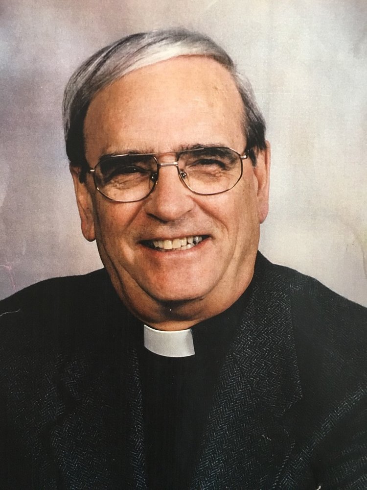 Father Armand  Guenette